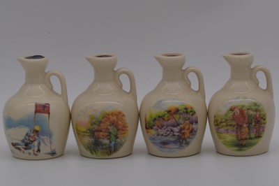 Lot 66 - Twenty four assorted Rutherford's ceramic decanters, sporting series