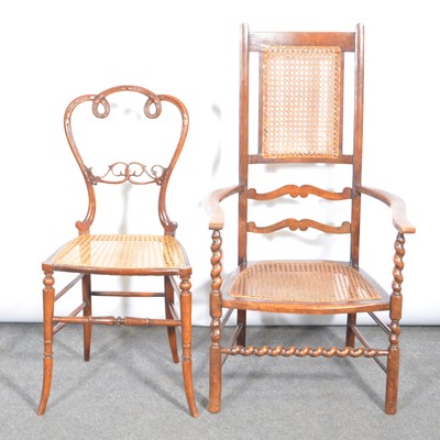 Lot 570 - Victorian walnut salon chair and a beech elbow chair