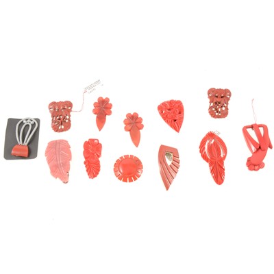 Lot 189 - Vintage Chinese-style cinnabar lacquer, dark orange lucite and red bakelite dress clips.