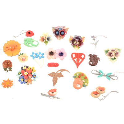 Lot 206 - American lucite flower-head brooch, Art Deco thistle brooch and other bakelite and celluloid floral brooches.