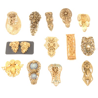 Lot 202 - Vintage filigree and pierced gilt metal dress clips.