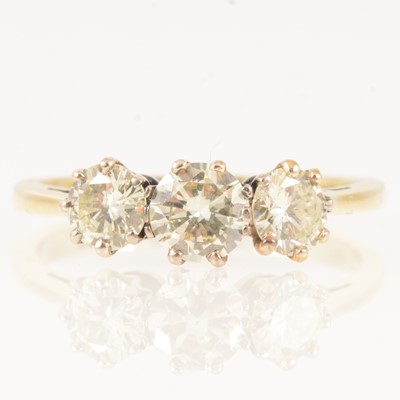 Lot 286 - A diamond three stone ring.