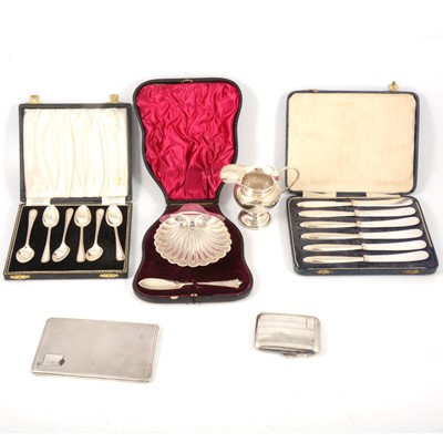 Lot 242 - Silver butter dish, cream jug, silver and white metal cigarette cases, plus cased silver flatware.