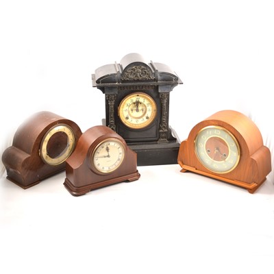 Lot 104 - A black slate mantel clock and three other wooden cased mantel clocks.