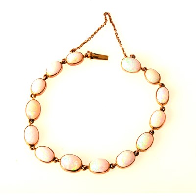 Lot 80 - A cabochon cut opal bracelet.