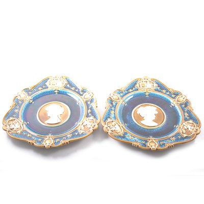 Lot 19 - Pair of Geman wall plates, cameo centre surrounded by vignettes.