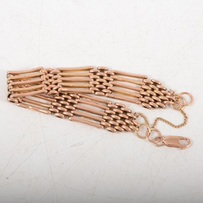 Lot 360 - A rose metal five bar gate link bracelet.