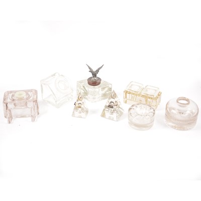 Lot 118 - Fifteen glass inkwells, various shapes and designs.