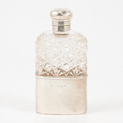 Lot 253 - A Victorian glass and silver hip flask, Hilliard & Thomason, Birmingham 1888 and 1889.