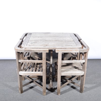 Lot 1029 - 'Collingwood' teak garden table and four chairs, retailed by Heals