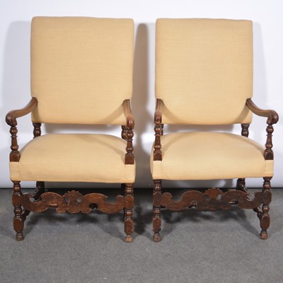 Lot 589 - Pair of walnut elbow chairs, fawn coloured...