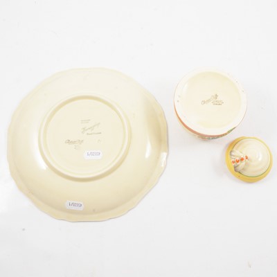 Lot 1018 - Clarice Cliff, a Crocus beehive preserve pot and cover, and an Aurea plate.