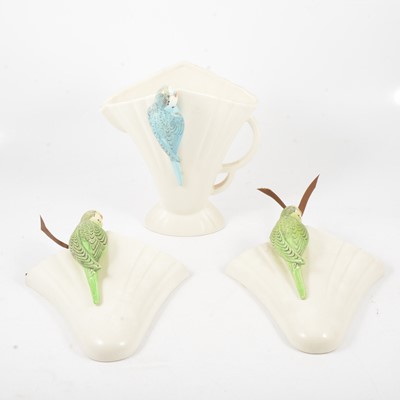 Lot 42 - A pair of Sylvac budgerigar wall pockets and a Falcon vase.
