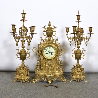Lot 165 - Three-piece mantel garniture and a pair of candelabra.