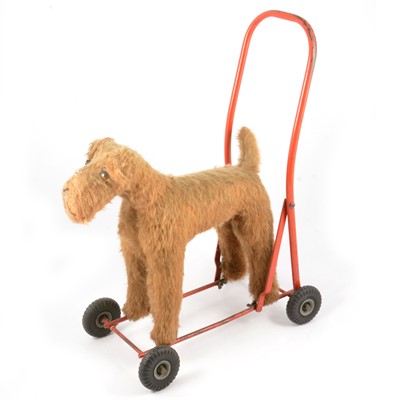 Lot 170 - International Model Aircraft ltd, Tri-ang push-a-long dog toy on wheels and steel stand.
