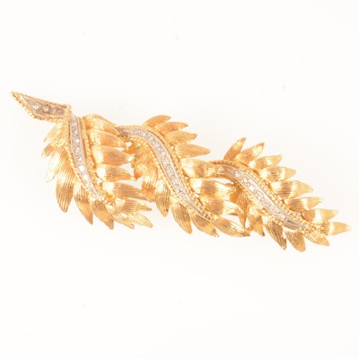 Lot 363 - A yellow metal diamond set brooch.