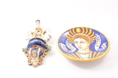 Lot 49 - Continental majolica wall pocket, and a charger