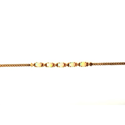 Lot 79 - An opal and diamond bracelet.