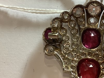 Lot 87 - An Edwardian style ruby, red spinel and diamond brooch/pendant.