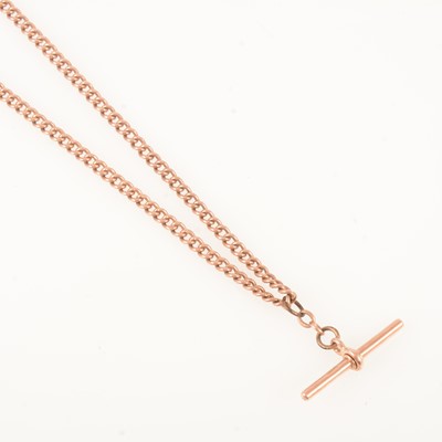 Lot 344 - A 9 carat rose gold double albert watch chain.