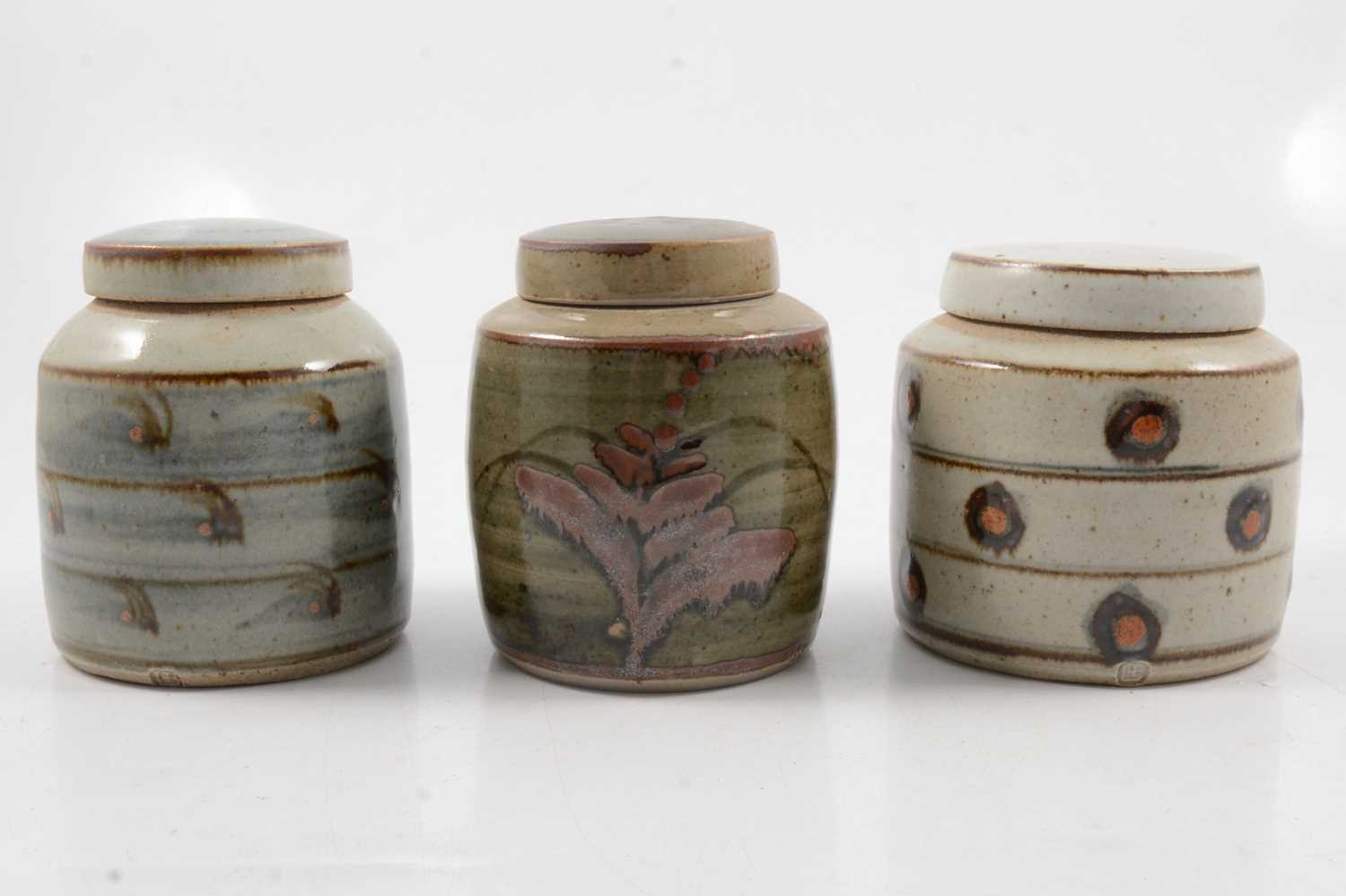 Lot 1044 - David Leach, three Lowerdown Pottery preserve jars and covers