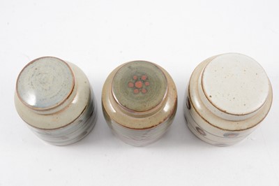 Lot 1044 - David Leach, three Lowerdown Pottery preserve jars and covers