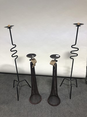 Lot 672 - Two pairs of contemporary pricket candlesticks