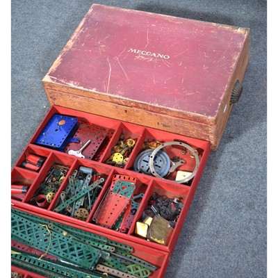 Lot 111 - Meccano, a c1930s collection of parts in a wooden case.