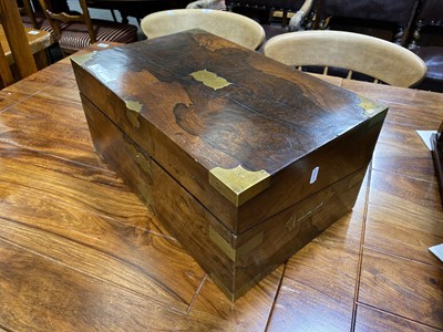 Lot 653 - A large brass bound rosewood writing slope with fitted interior and key.