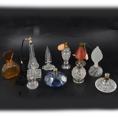 Lot 127 - Two trays of vintage scent bottles and atomisers, a collectors' book and a spill vase.