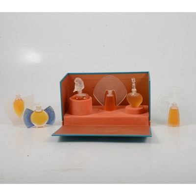 Lot 123 - Six Lalique miniature perfume bottles.