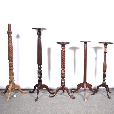Lot 583 - Four mahogany jardiniere stands and a standard lamp