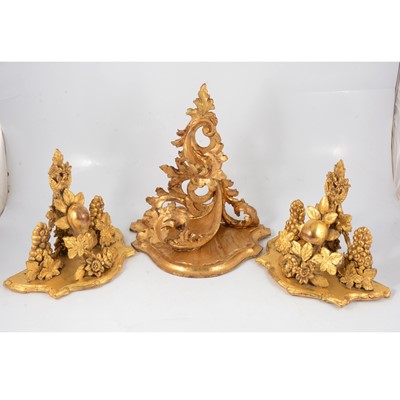 Lot 54 - Florentine style wall bracket and a pair of other brackets
