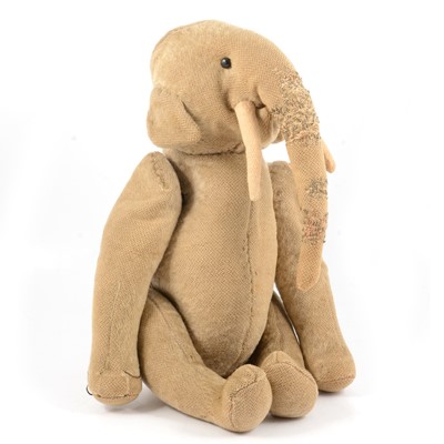 Lot 295 - An early 20th century toy straw filled elephant, possibly by Steiff