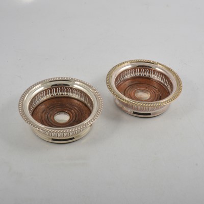 Lot 239 - Silver coaster, Garrard & Co Limited, Birmingham 1985, and an electroplated coaster, Mappin & Webb