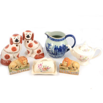 Lot 86 - Pair of flat back dogs, pair of lions, Wedgwood clock and other decorative ceramics.
