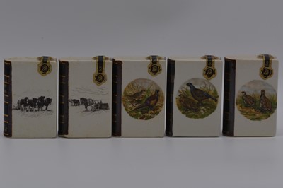 Lot 90 - Fourteen assorted Rutherford's ceramic book decanters, miscellaneous