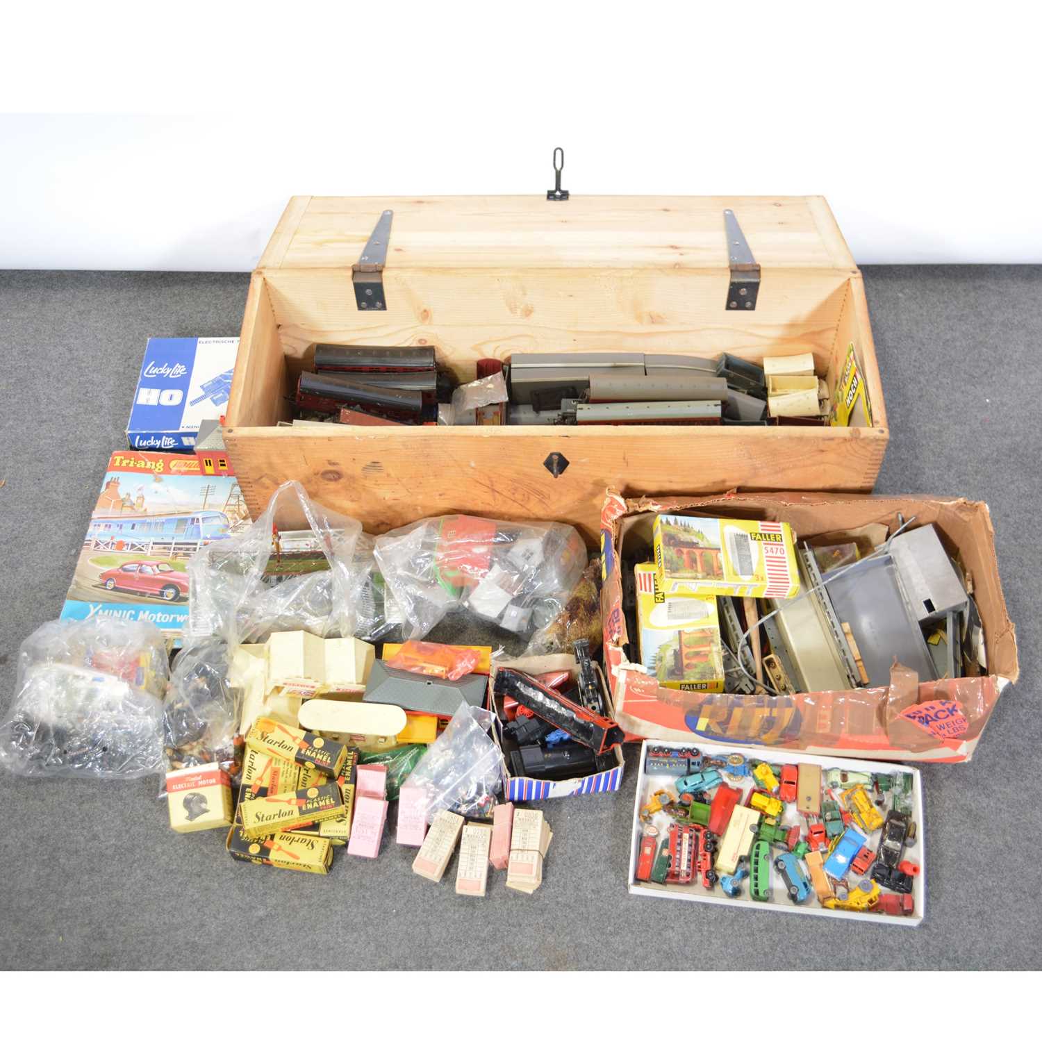 Lot 31 - A trunk of model railways and Matchbox models.