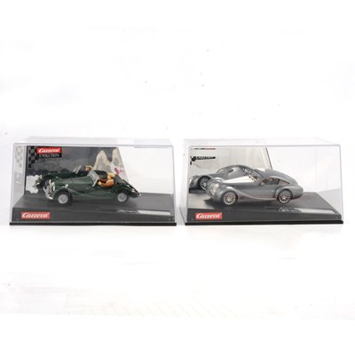 Lot 183 - Two Carrera Evolution slot-car racing models.