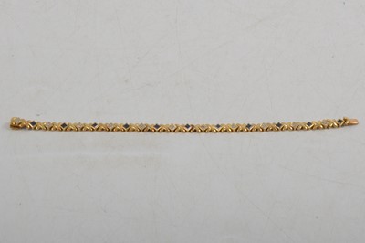 Lot 279 - A sapphire and diamond bracelet.