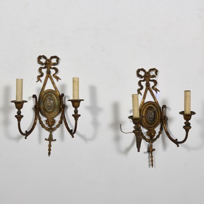Lot 119 - Pair of gilt metal twin arm wall lights.