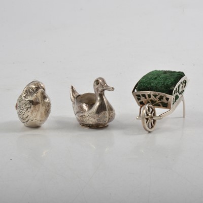 Lot 219 - Three Edwardian novelty pin cushions, wheelbarrow, duck and chick