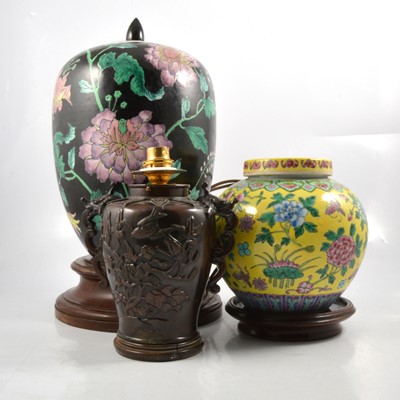 Lot 140 - A modern yellow ground famille rose jar, famille noir vase