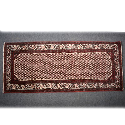 Lot 583 - An Oriental runner