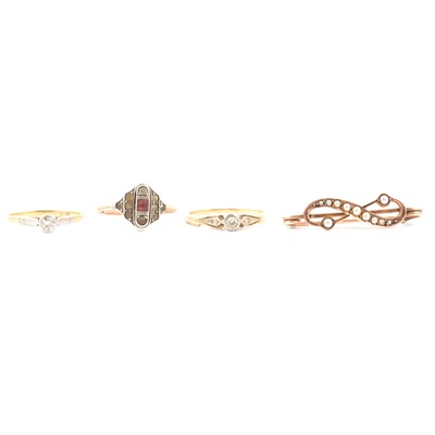 Lot 55 - Three rings and a small seed pearl bar brooch.