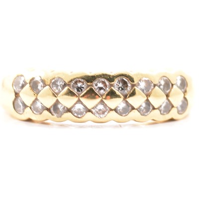Lot 23 - An 18 carat yellow gold half hoop ring set with two rows of diamonds.