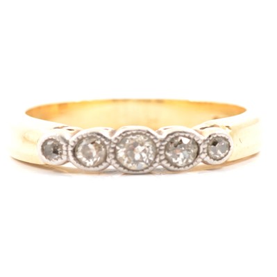 Lot 13 - A diamond five stone ring.
