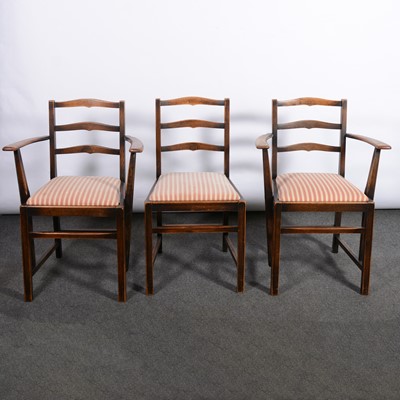 Lot 376 - Ercol style dark oak dining suite