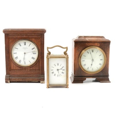 Lot 73 - Small brass carriage clock and two oak cased clocks