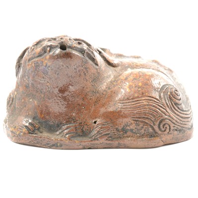 Lot 19 - Archaic style Chinese stoneware model of a Buddhistic temple dog.
